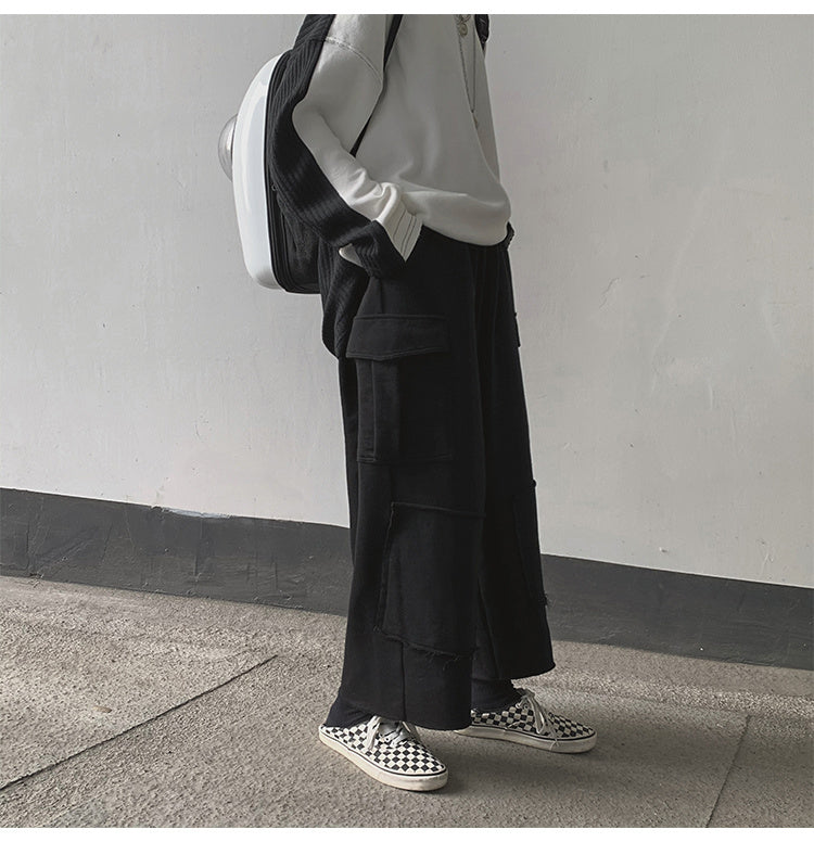 Pantaloni a vita alta, dritti, larghi e a gamba larga