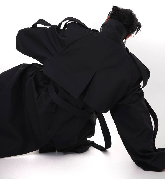 Manteau à épaules rembourrées, coupe-vent tridimensionnel, haut long au-dessus du genou