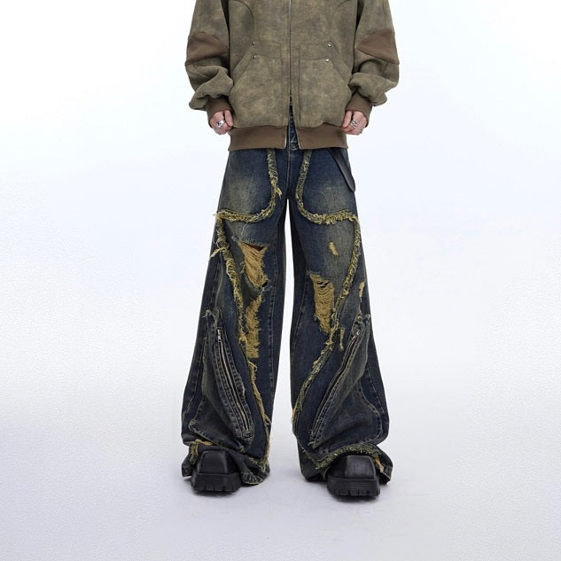 Jean rétro à franges, effet vieilli, déconstruction de niche lourde