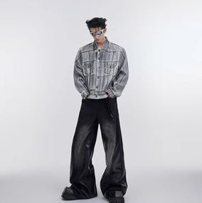 Veste en jean déconstruite à épaules rembourrées et enduites