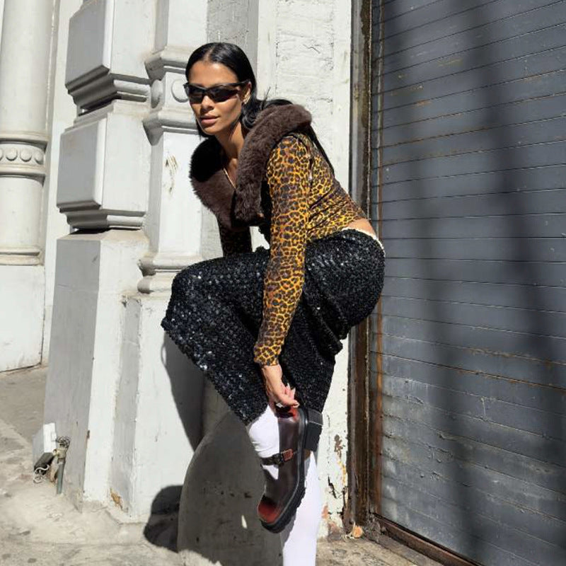 Haut Temperament à manches longues et coupe ajustée, dévoilant le ventre