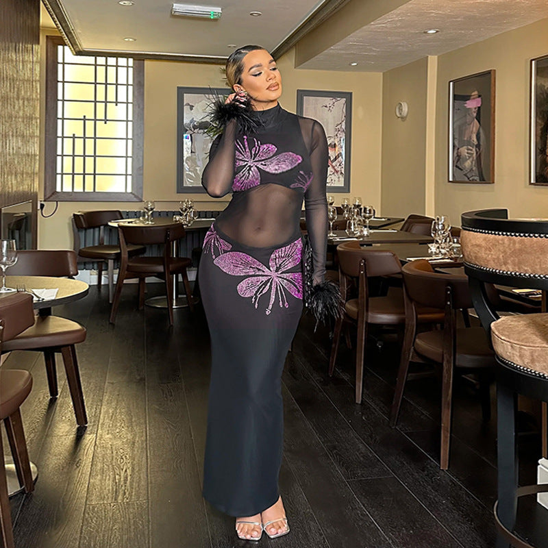 Robe à manches longues avec strass et papillon