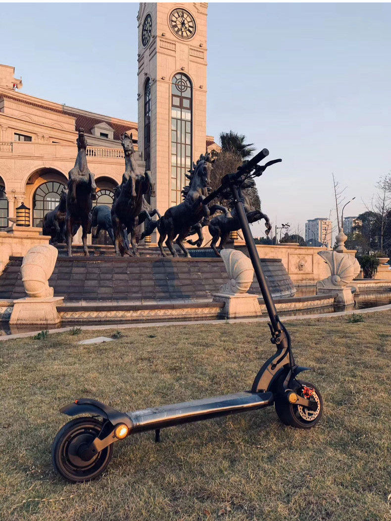 Scooter pliant à double entraînement avec pneus larges