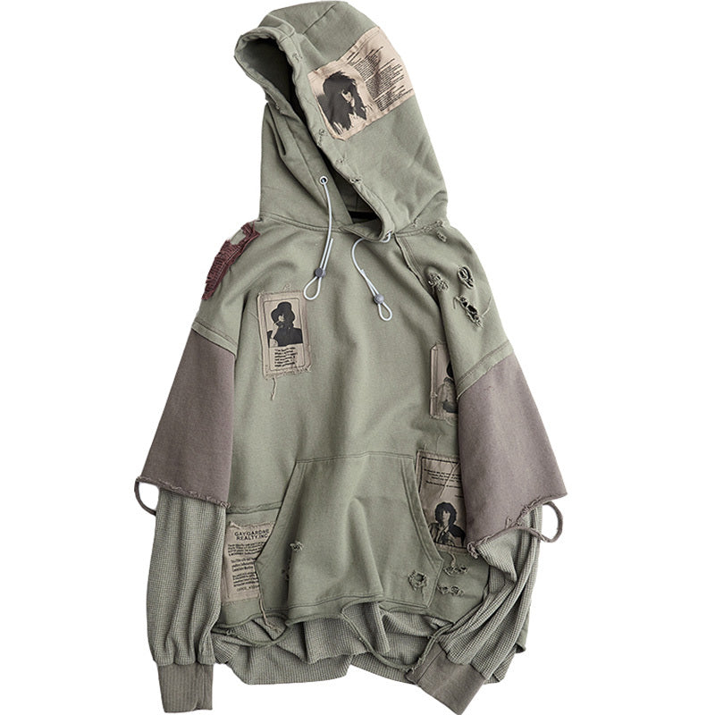 Cucitura di due finte toppe di distruzione del maglione