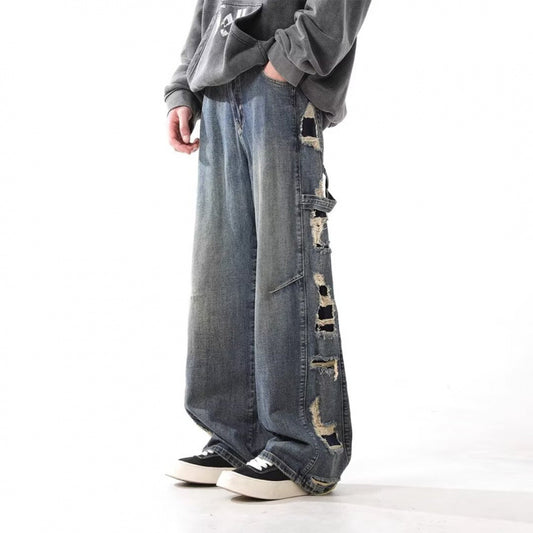 Jean homme délavé, déchiré, coupe droite ample