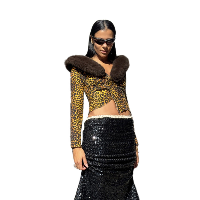 Haut Temperament à manches longues et coupe ajustée, dévoilant le ventre