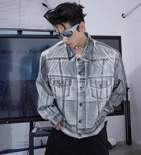 Veste en jean déconstruite à épaules rembourrées et enduites