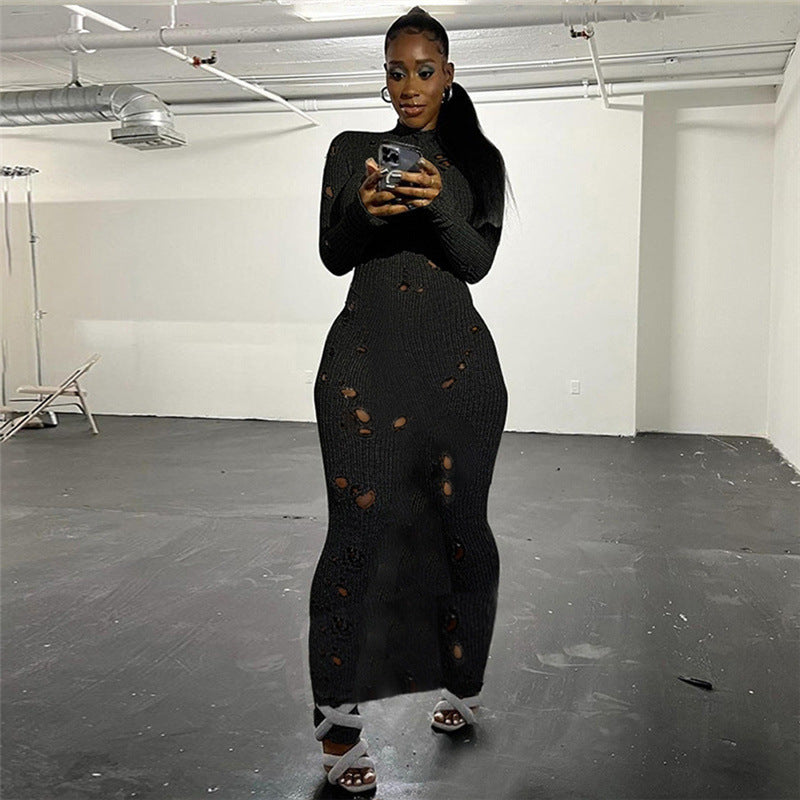 Abito aderente in maglia cava con scollo a V