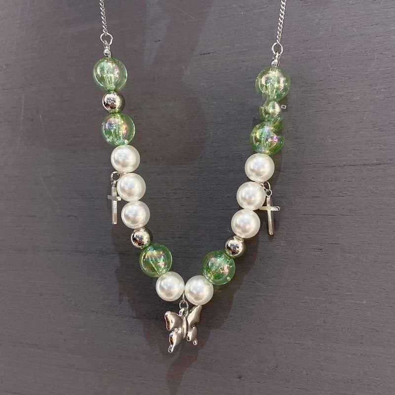 Collana con perle verdi intrecciate