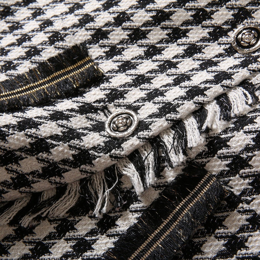 Jupe courte à franges en fil d'or et motif pied-de-poule