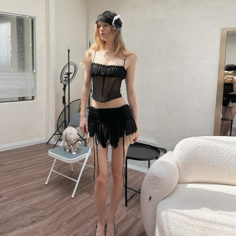 Gonna a pieghe a vita bassa con pieghe sexy da ragazza calda e top in rete