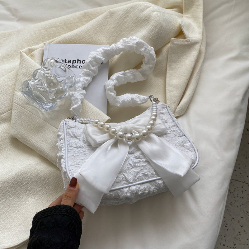 Nouveau sac sous les bras Pearl Bow