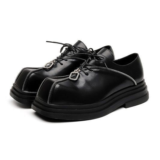 Chaussures de ville tendance pour hommes, à bout carré et semelle épaisse, style punk unique avec fermeture éclair, en cuir noir.