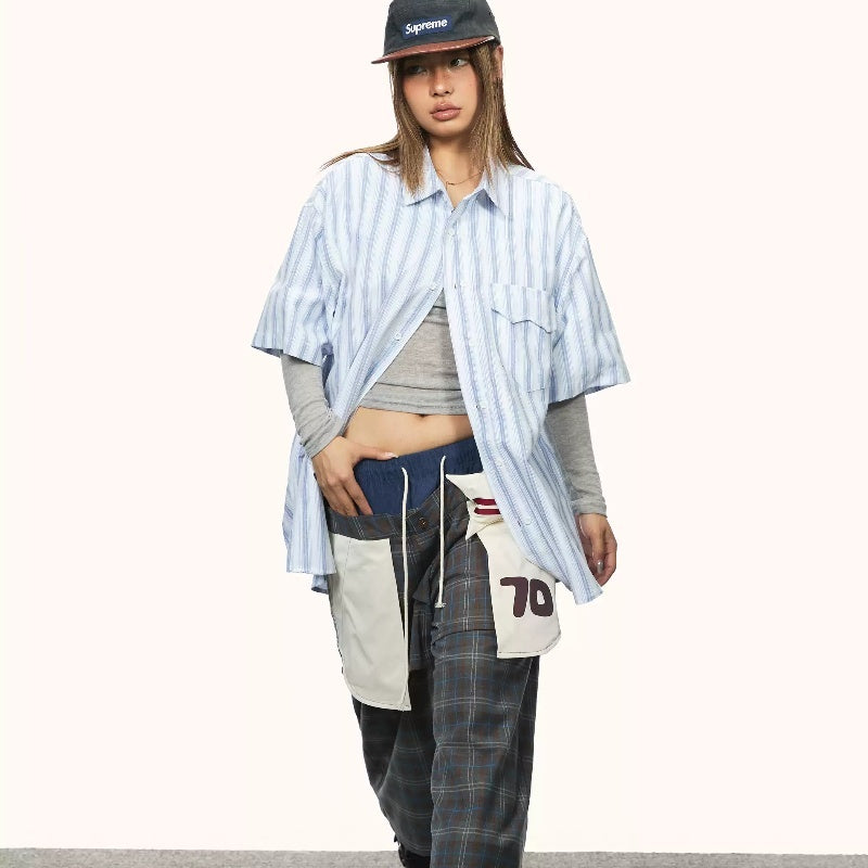 Chemise à manches courtes à rayures bleues, coupe ample et décontractée