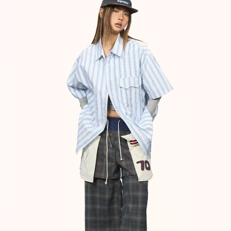 Chemise à manches courtes à rayures bleues, coupe ample et décontractée