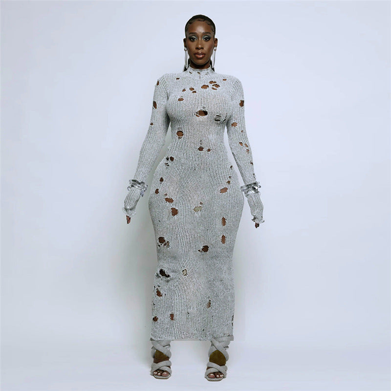 Abito aderente in maglia cava con scollo a V