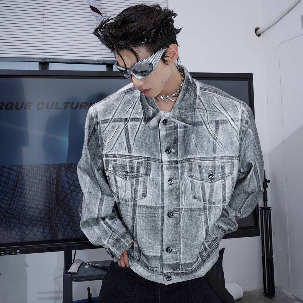 Veste en jean déconstruite à épaules rembourrées et enduites