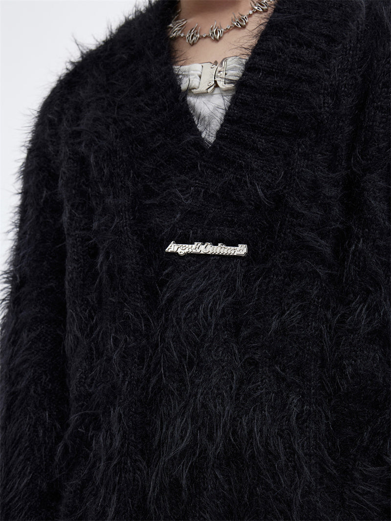 Pull ample à col en V en vison