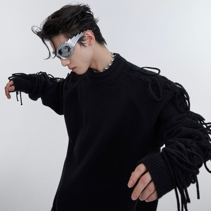 Pull en tricot à franges déconstruites et col froncé