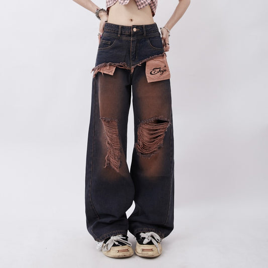 Coutures déchirées et lavées pour les vieux pantalons de cow-boy