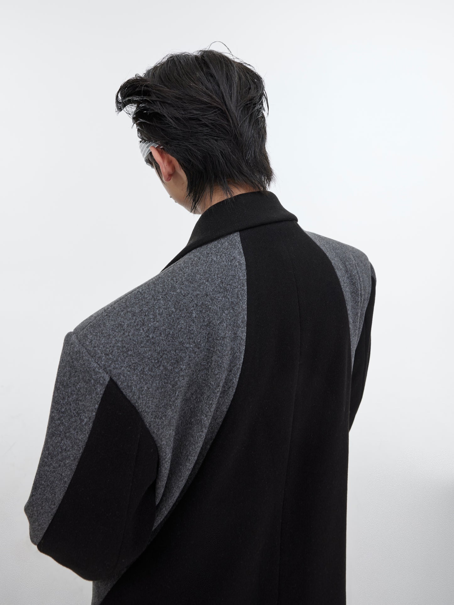 Cappotto lungo in lana al ginocchio con patchwork di colori a contrasto