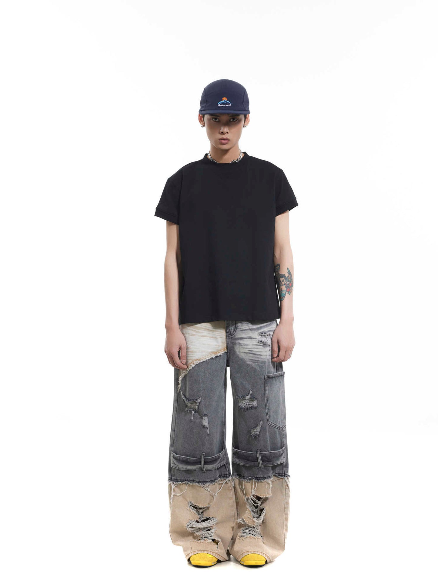 Jean skinny délavé et coutures endommagées de style industriel lourd de Niche