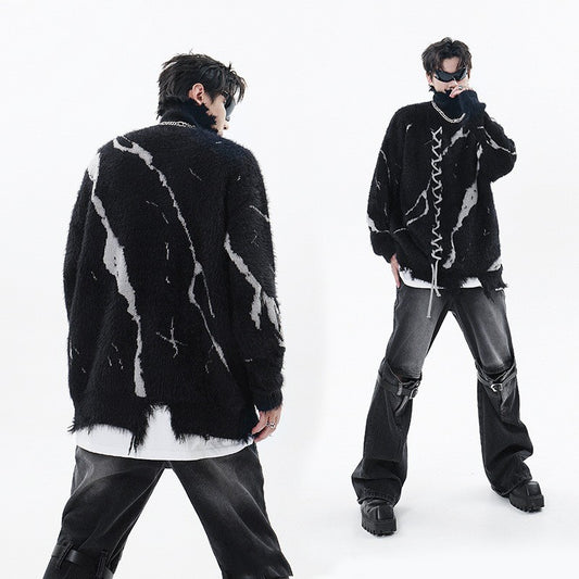 Pull à col roulé en corde jacquard à motif déchiré