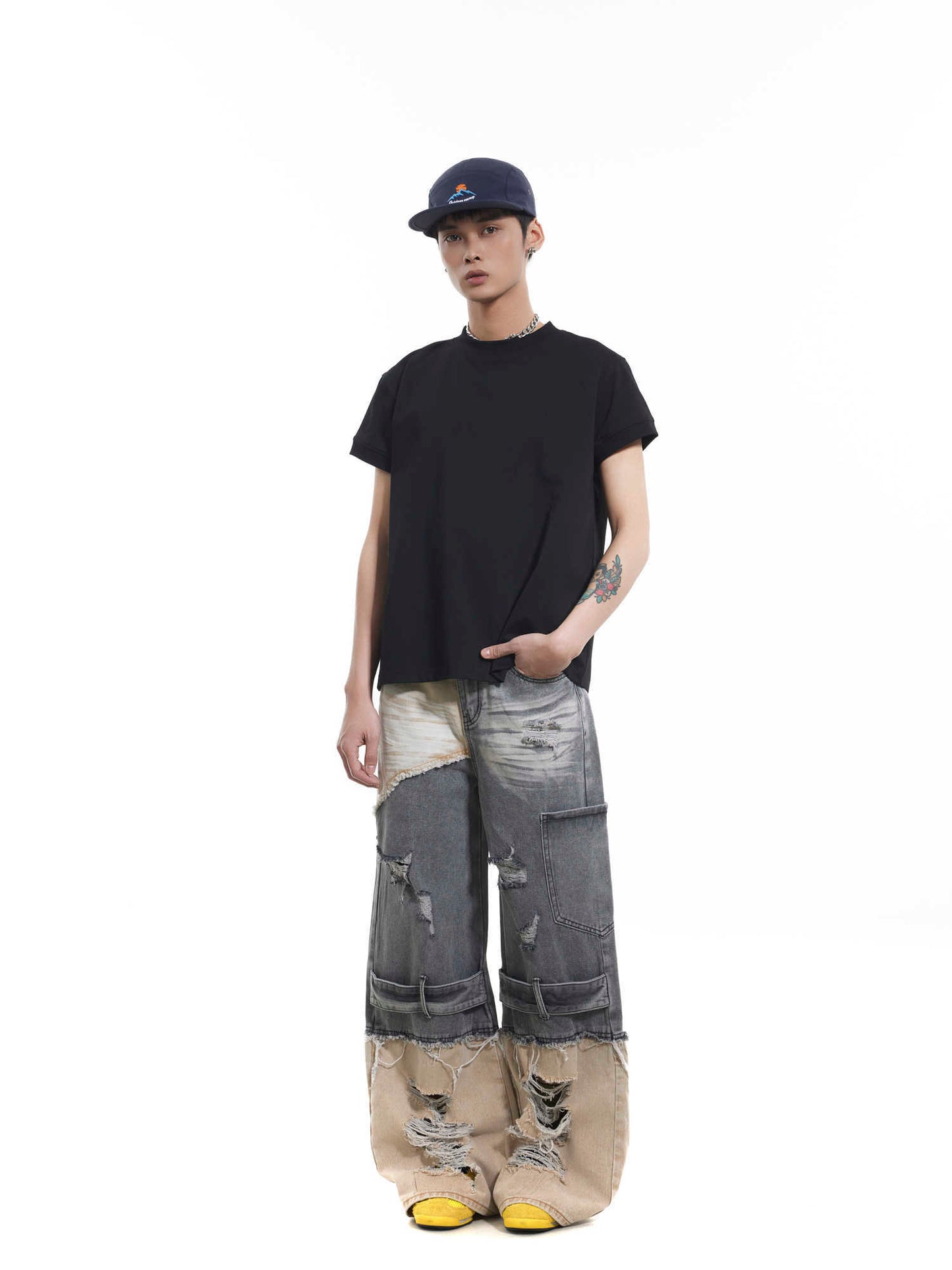 Jean skinny délavé et coutures endommagées de style industriel lourd de Niche