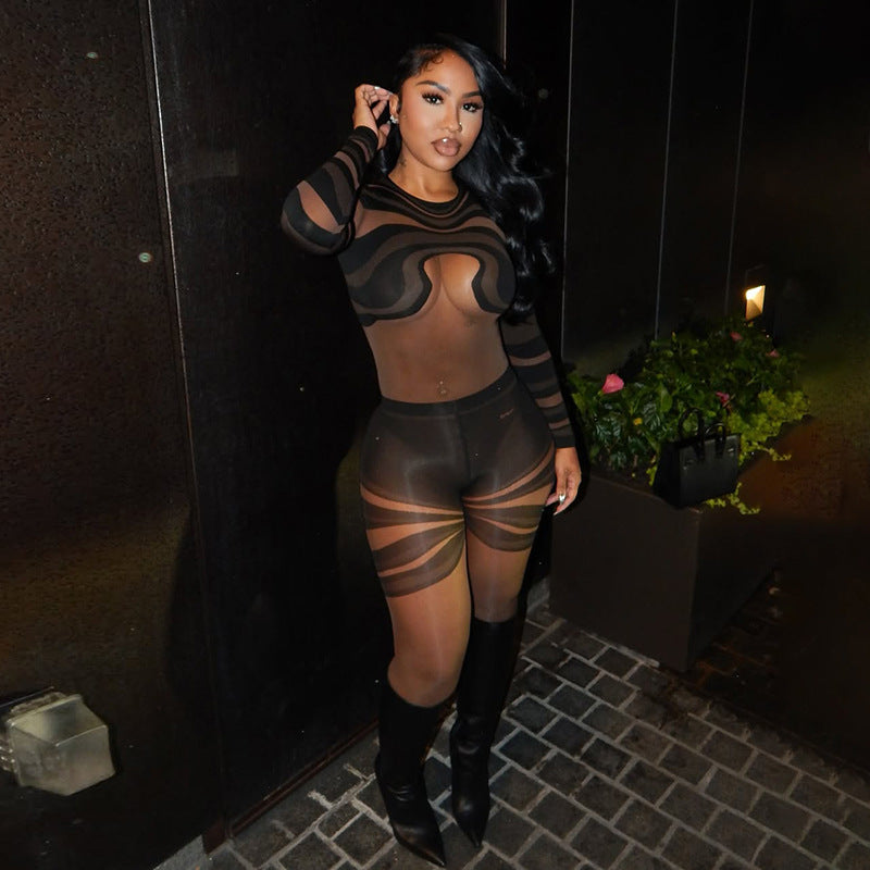 Tuta con stampa floreale in rete e colori a contrasto