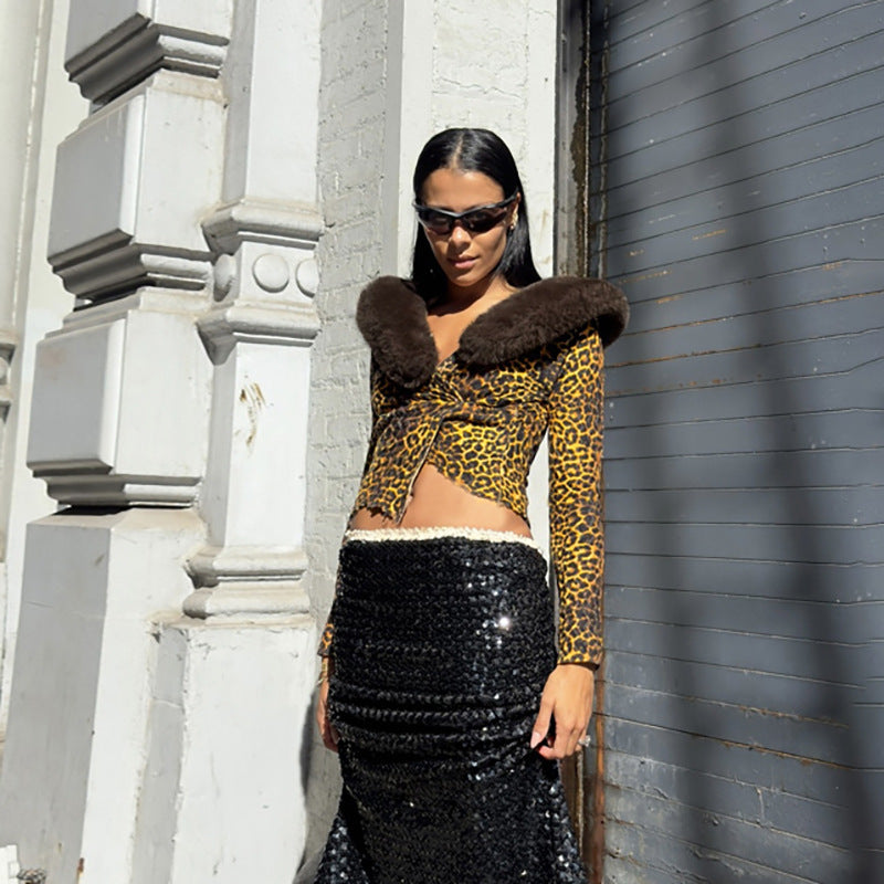 Haut Temperament à manches longues et coupe ajustée, dévoilant le ventre