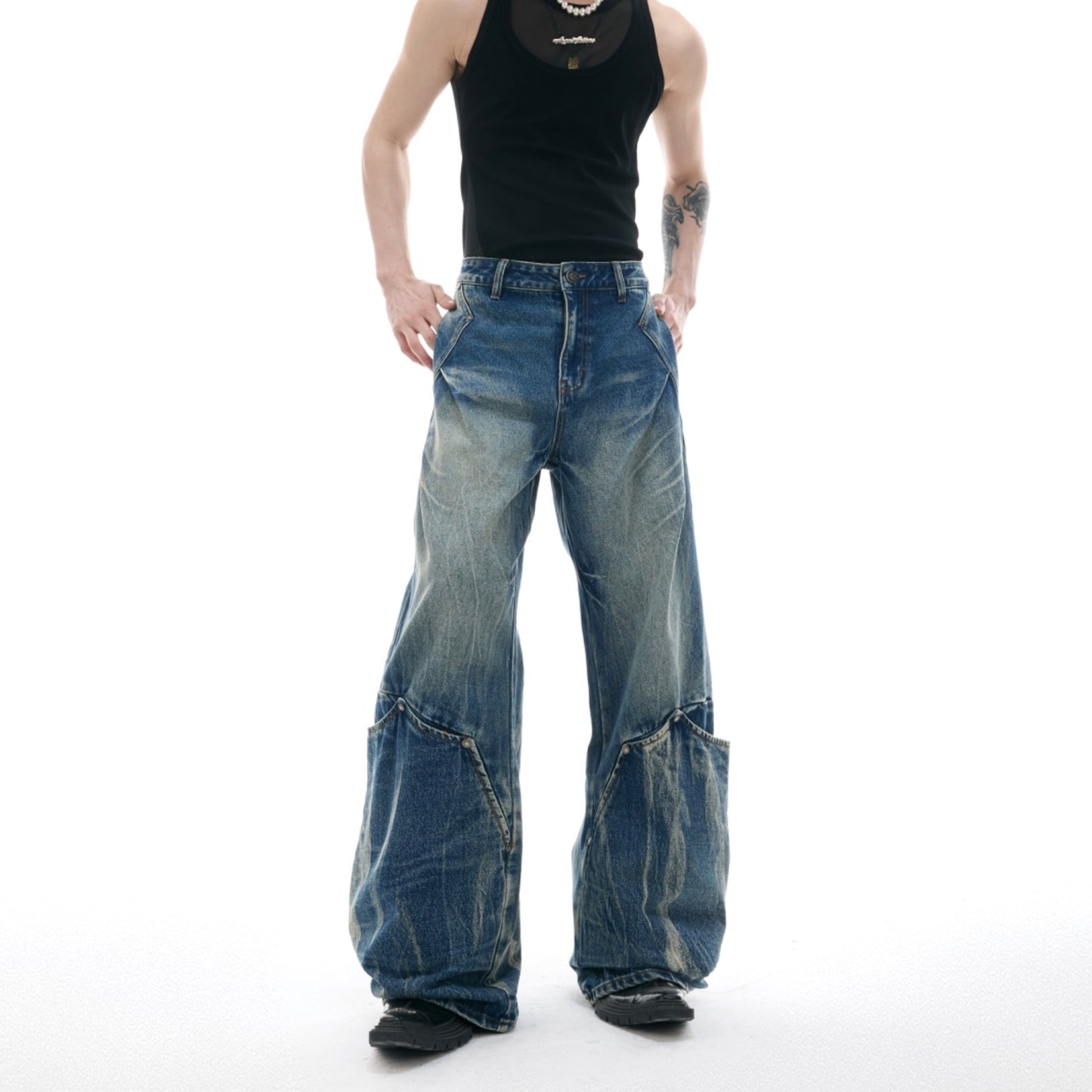 Jean homme rétro délavé à motif explosif et coupe évasée