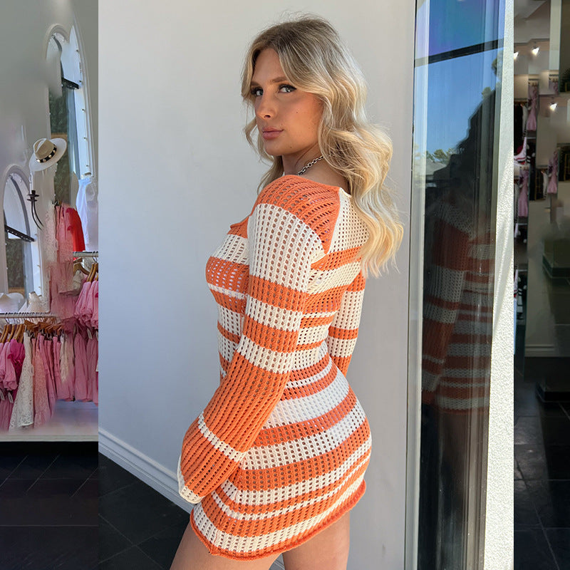 Abito lavorato a maglia a maniche lunghe traforate