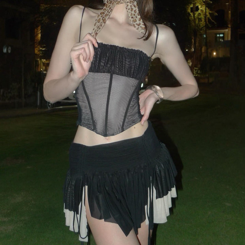 Gonna a pieghe a vita bassa con pieghe sexy da ragazza calda e top in rete