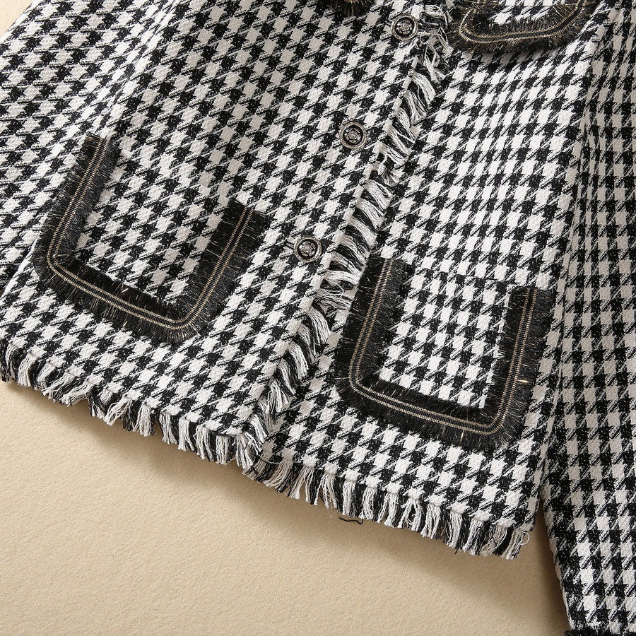 Jupe courte à franges en fil d'or et motif pied-de-poule