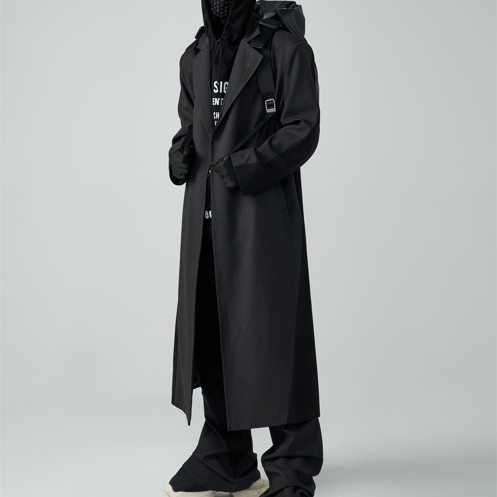 Manteau mi-long en laine, ample et rembourré, à épaules dénudées et patchwork