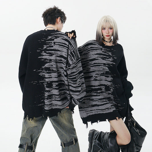 Pull tricoté ample à col rond et pompons déchirés, motif zèbre assorti